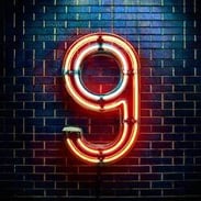 Firefly Create a photorealistic graphic of neon signage that is shaped as the numeral 9 and installe-1