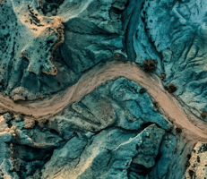 Aerial terrain landscape representing the complex path of enterprise AI adoption